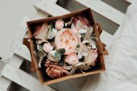 3_artificial-decorative-flowers-paper-box-table-close-up_SMALL